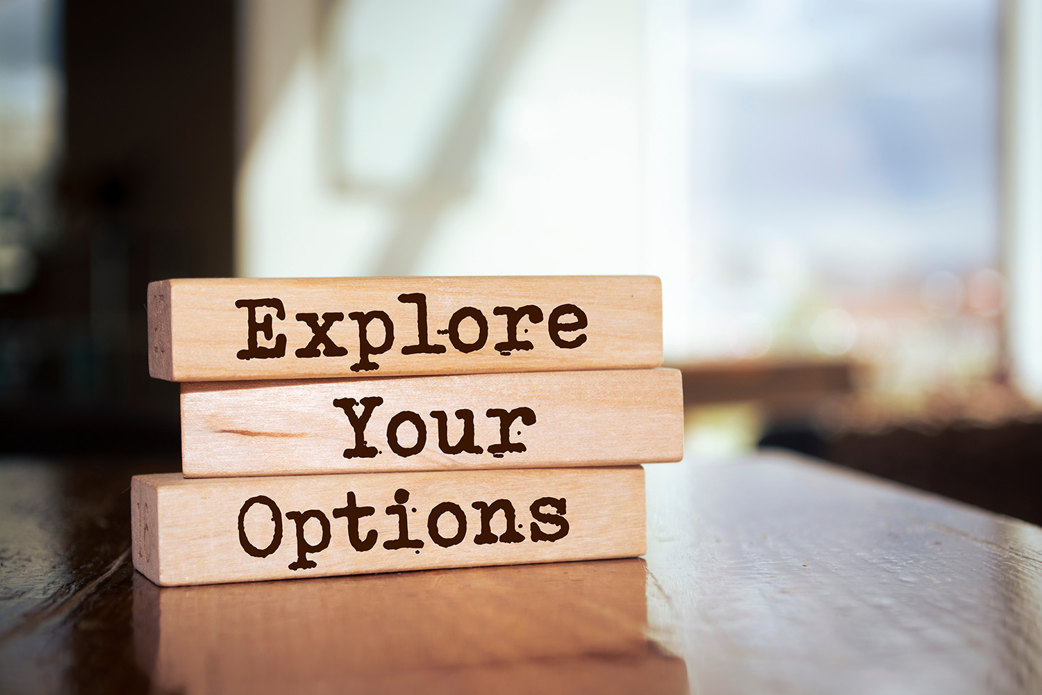 Wooden blocks with words 'Explore Your Options'. Wooden blocks with words 'Explore Your Options'.